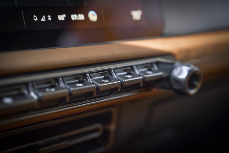 Physical button controls in vehicle